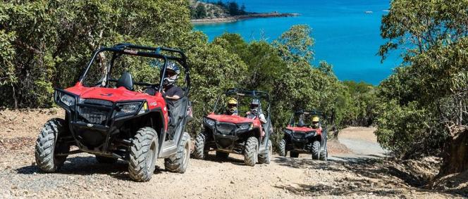 atv-driving-up-road-with-outlook